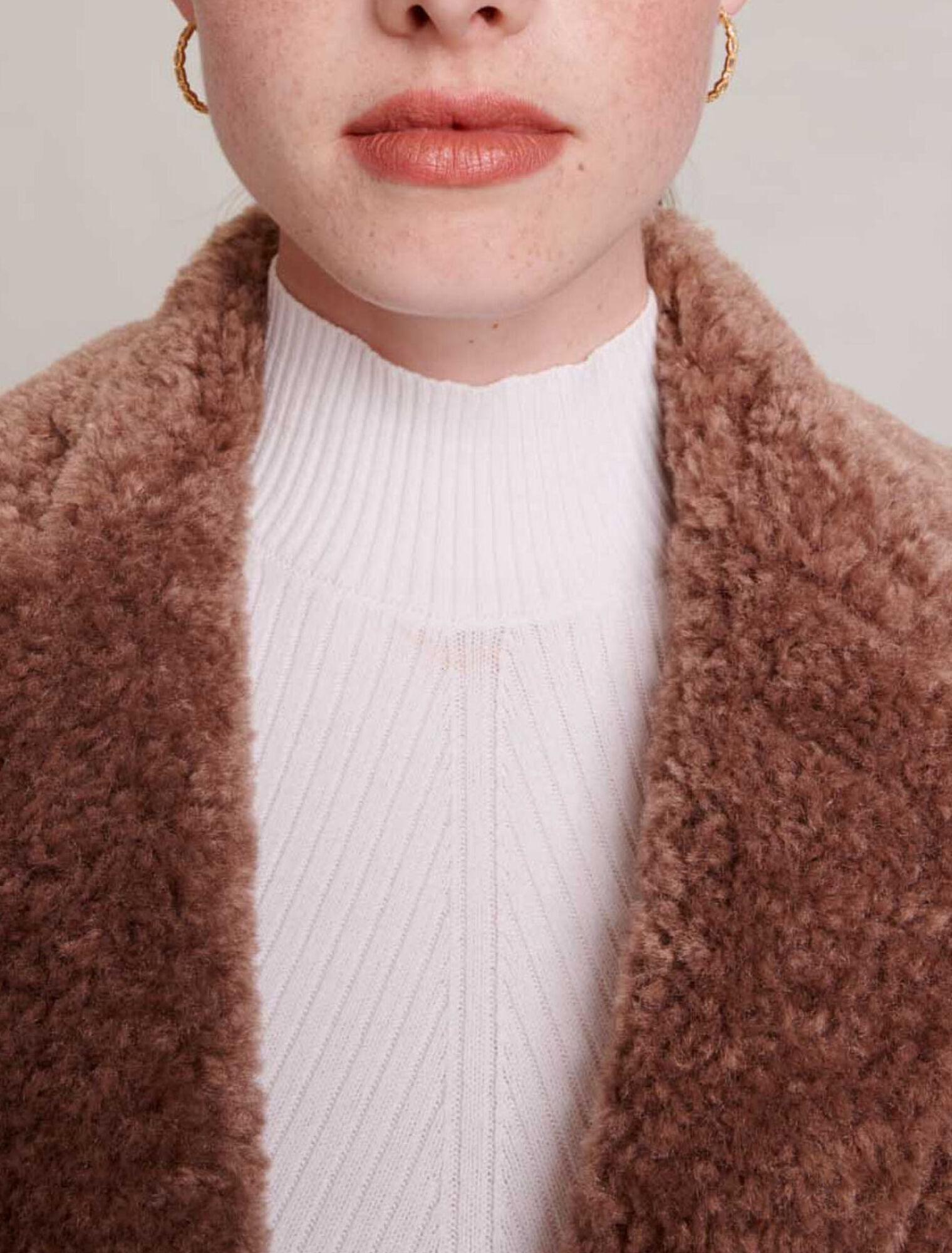 Cappotto lungo in ecopelliccia