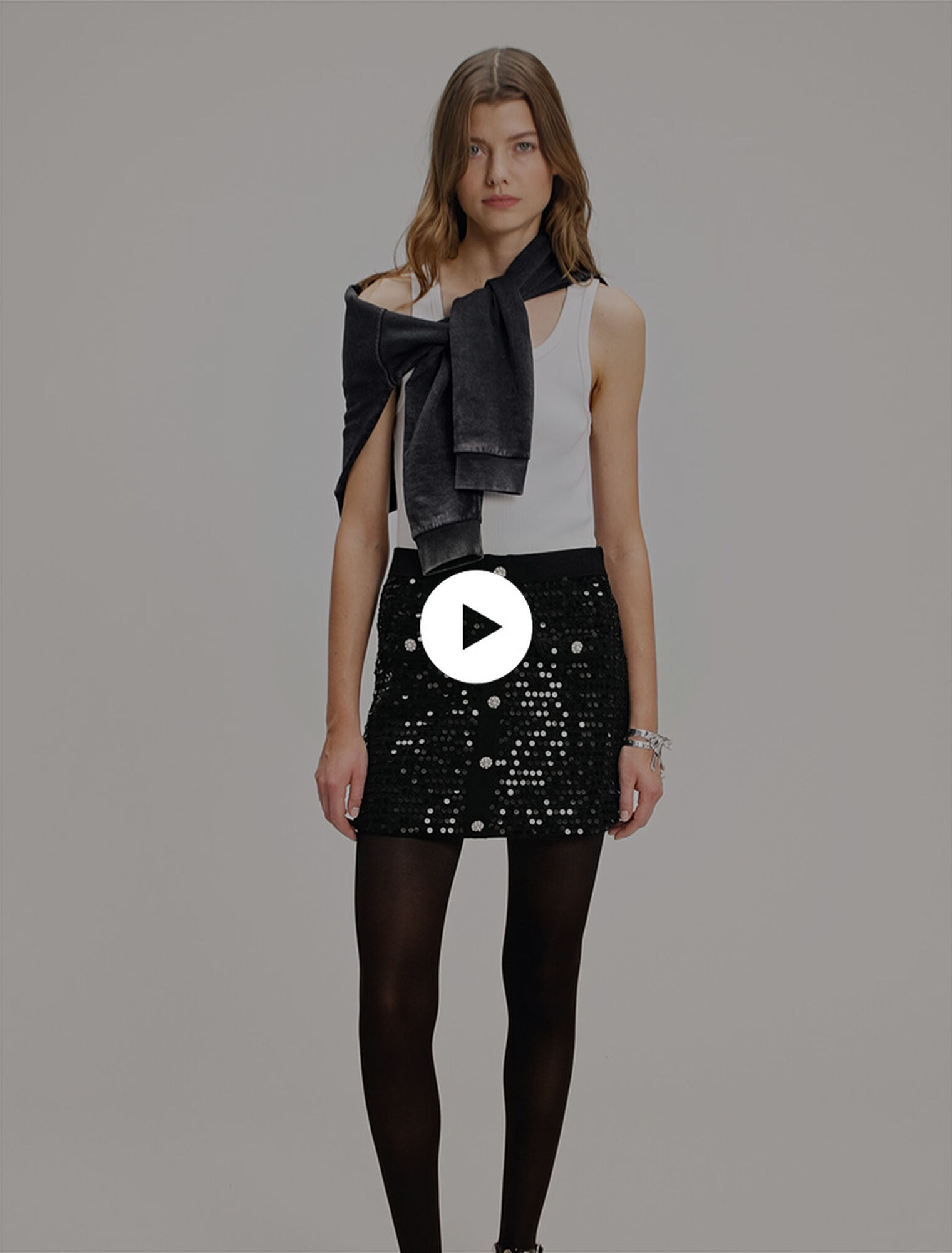 Gonna corta in maglia paillettes