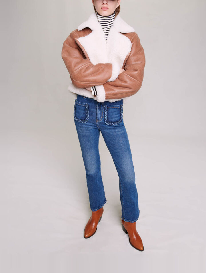 Jeans con dettagli intrecciati