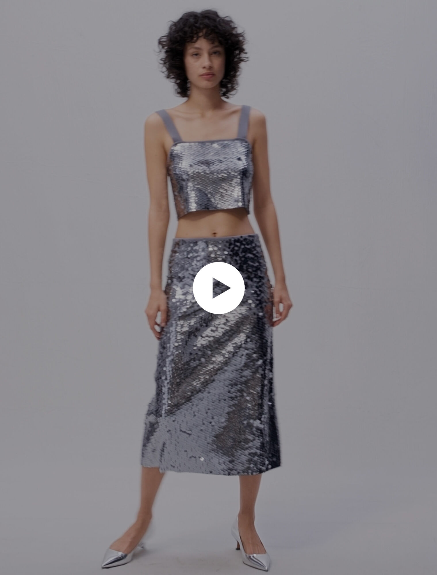 Top in maglia glitterata