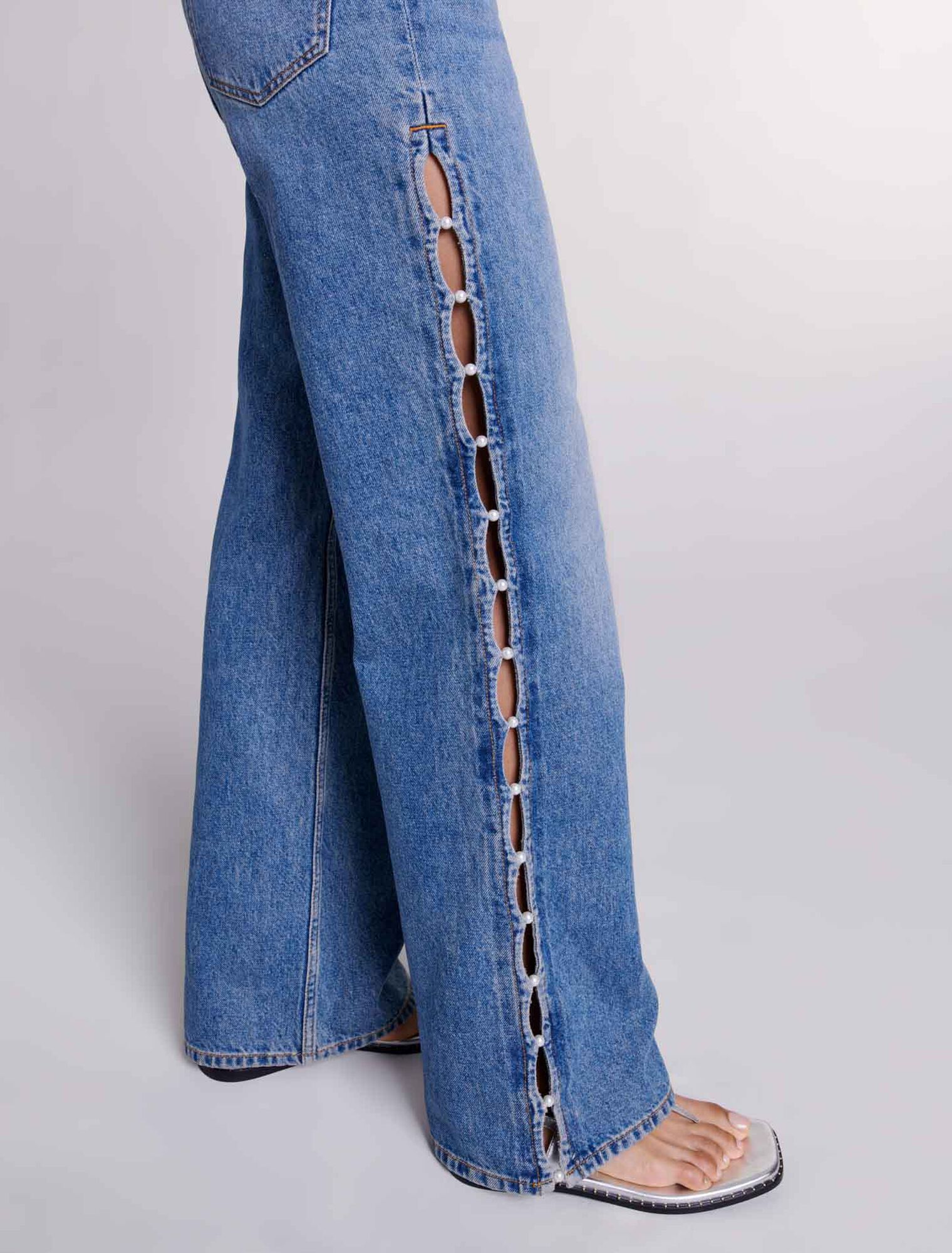 Jeans dritti traforati con perline