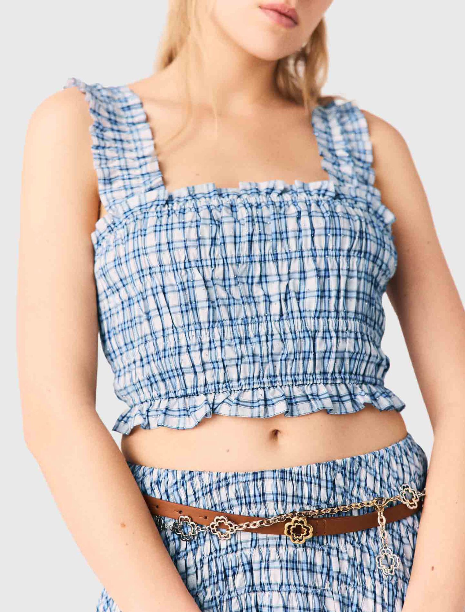 Top punto smock in cotone strassato