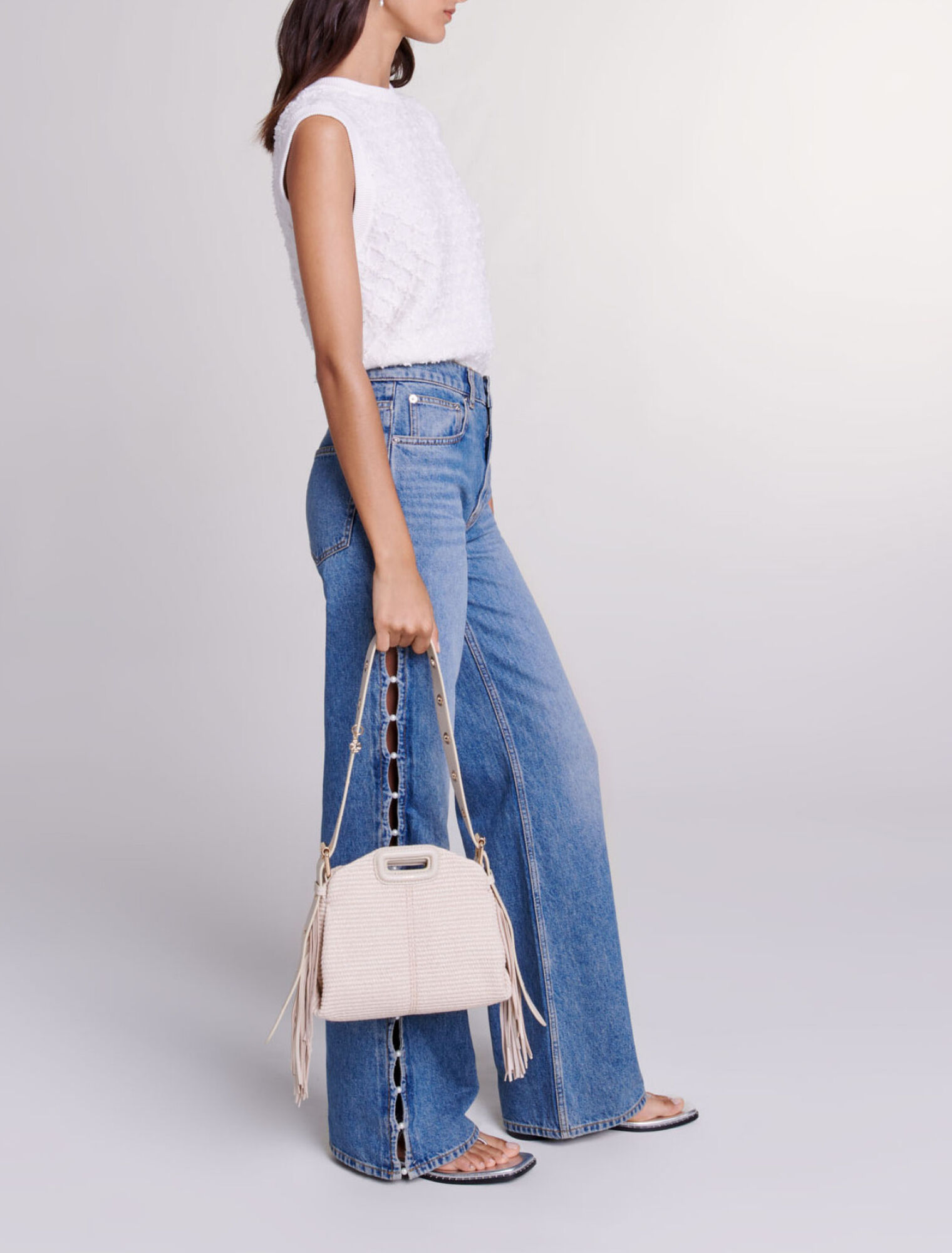 Jeans dritti traforati con perline