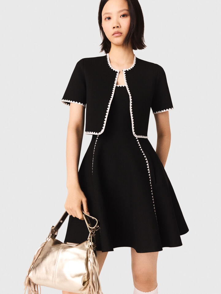 Cardigan corto con impunture