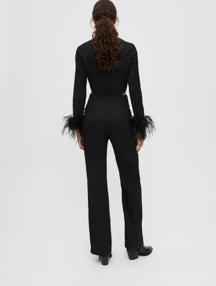 Tuta pantalone in piume nere