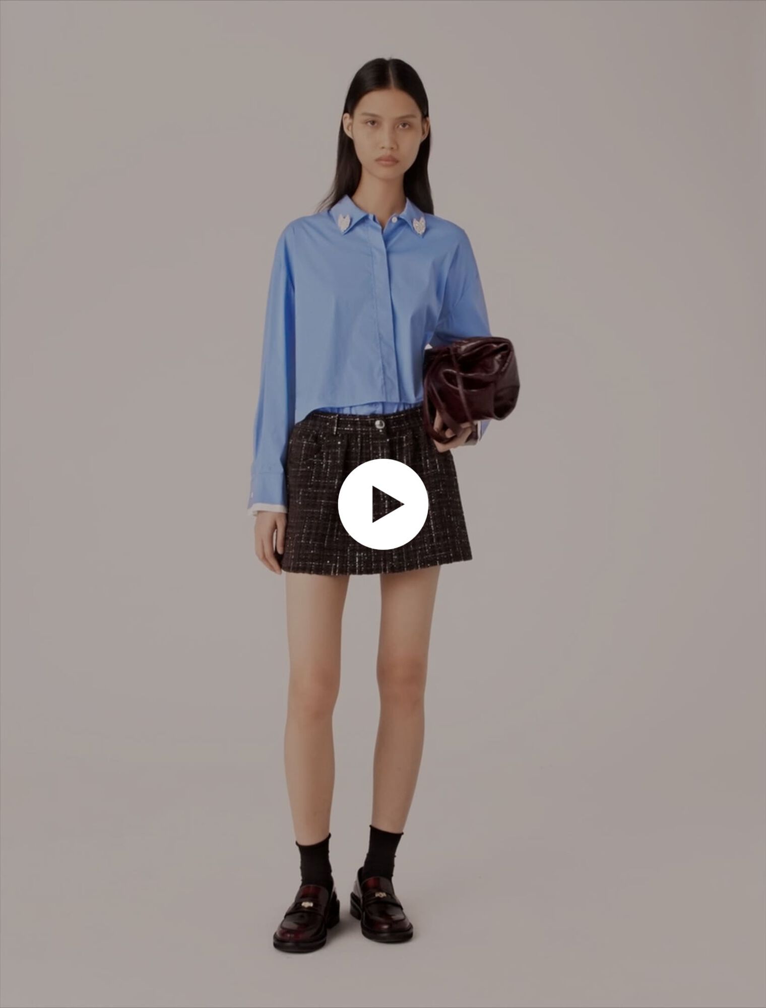 Shorts in tweed con fascia elastica