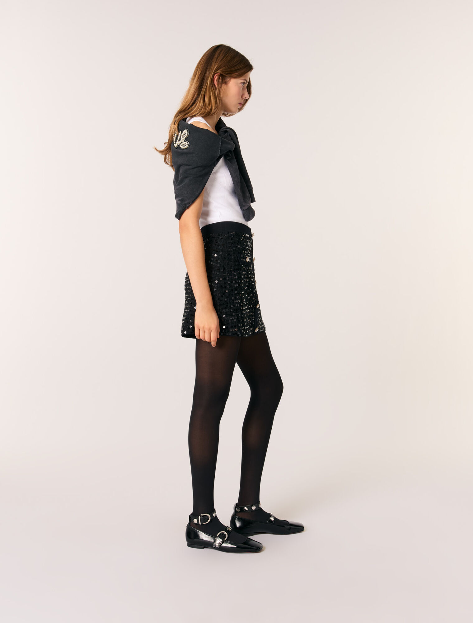 Gonna corta in maglia paillettes