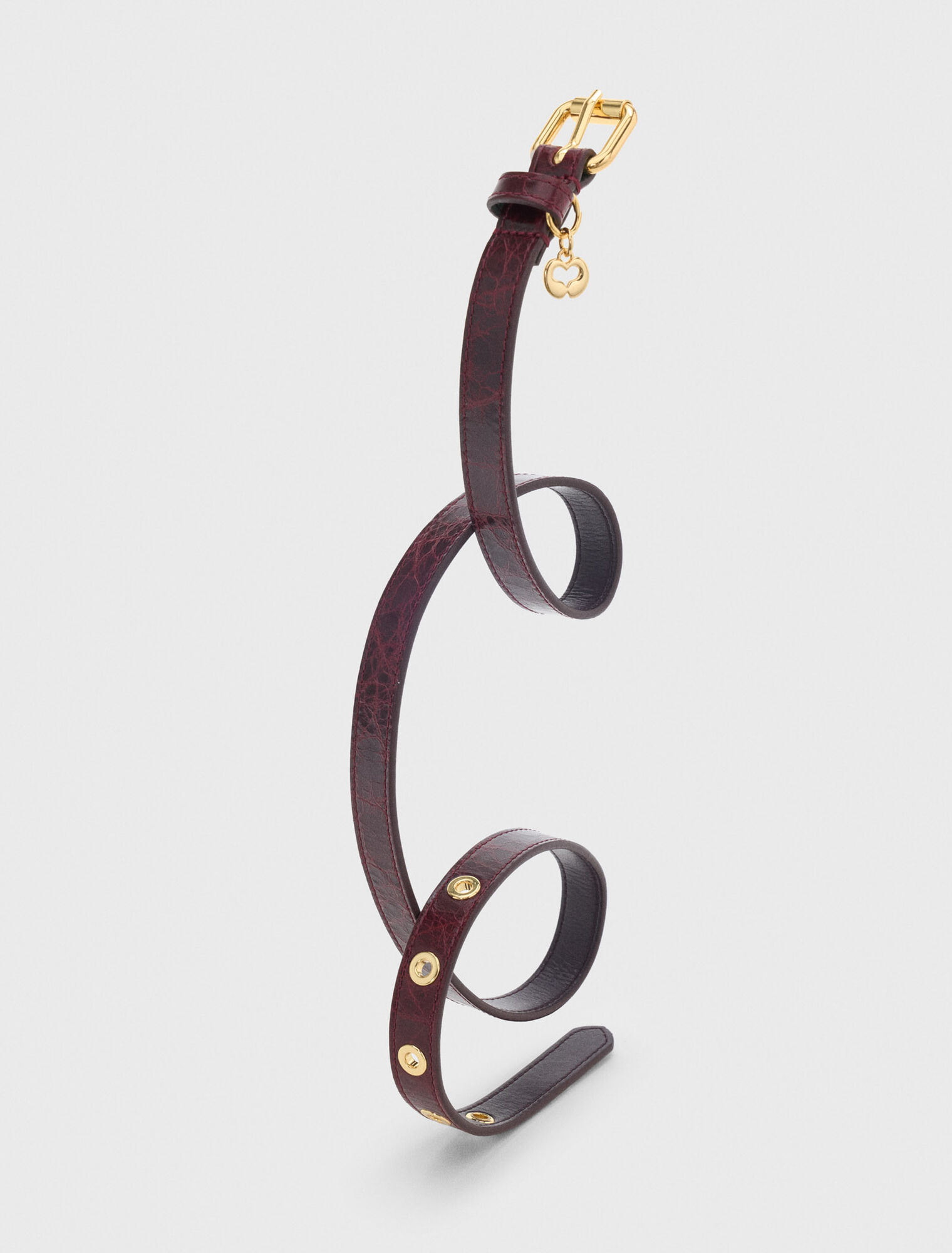 Cintura fine in pelle con occhielli
