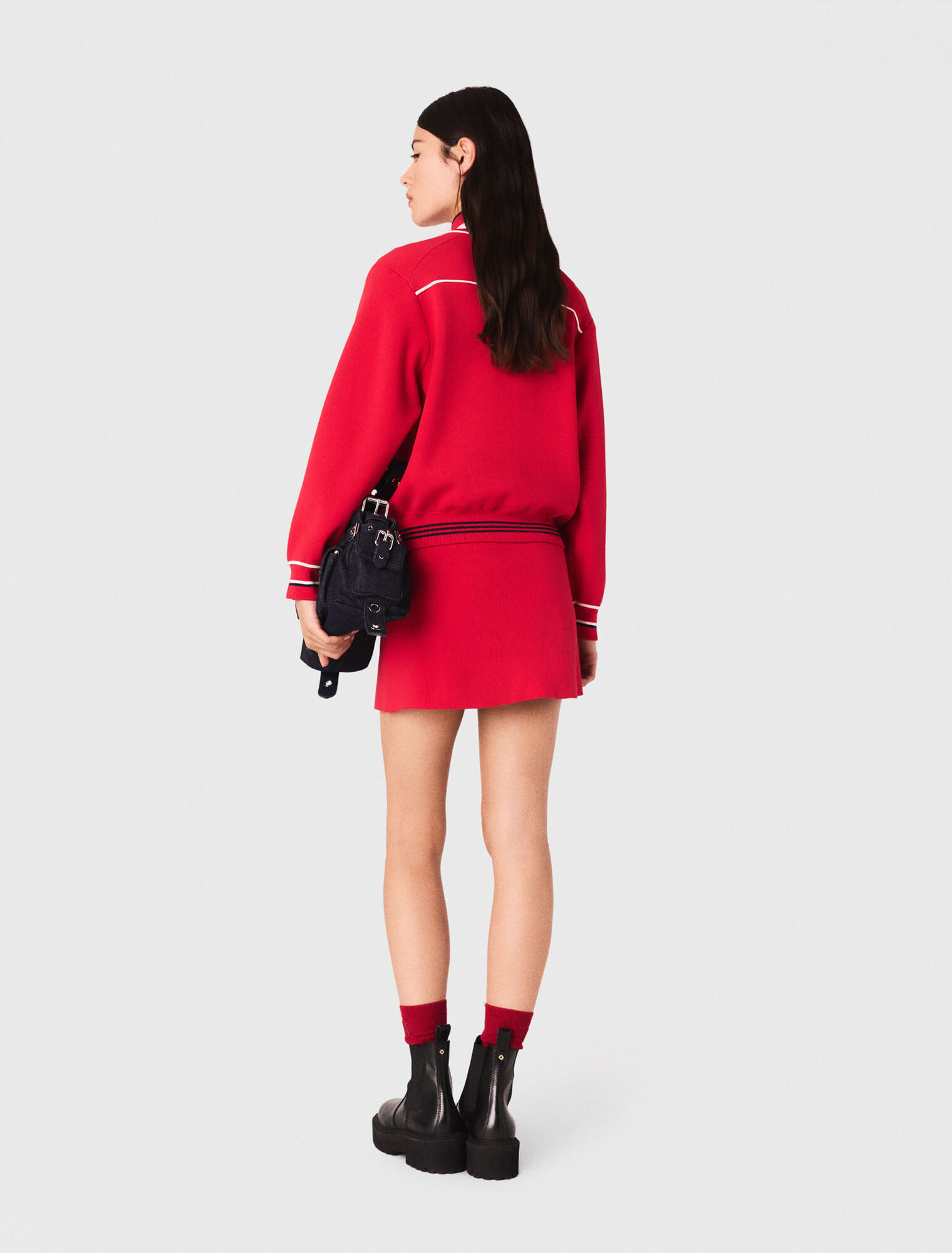 Cardigan con zip e vita elastica