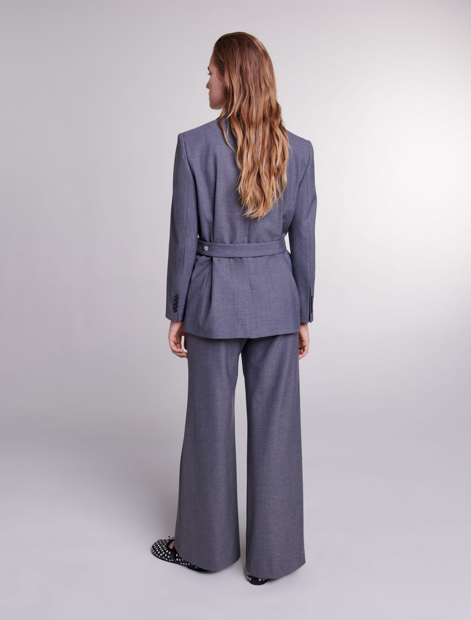 Giacca tailleur con catena in vita