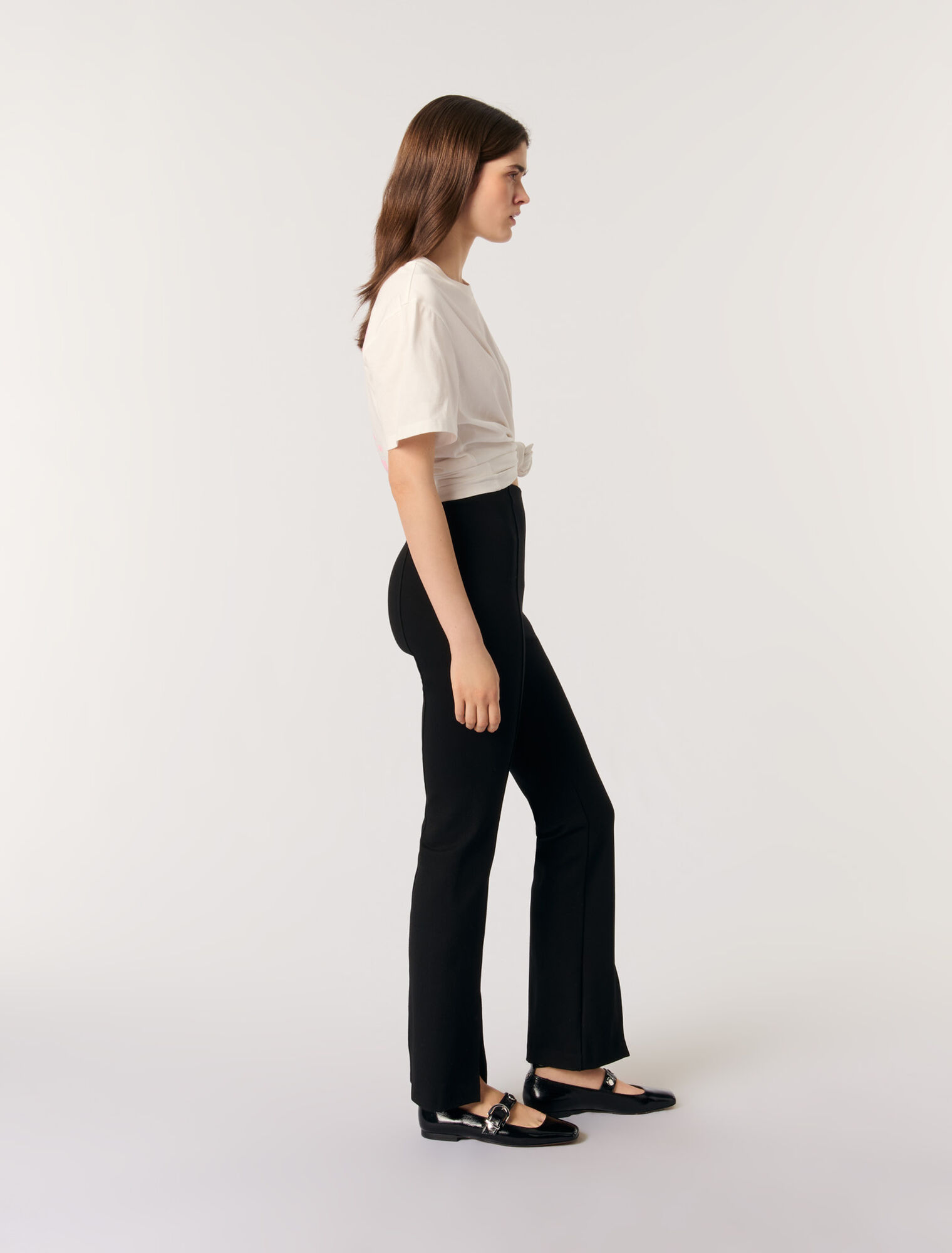 Pantaloni con spacco