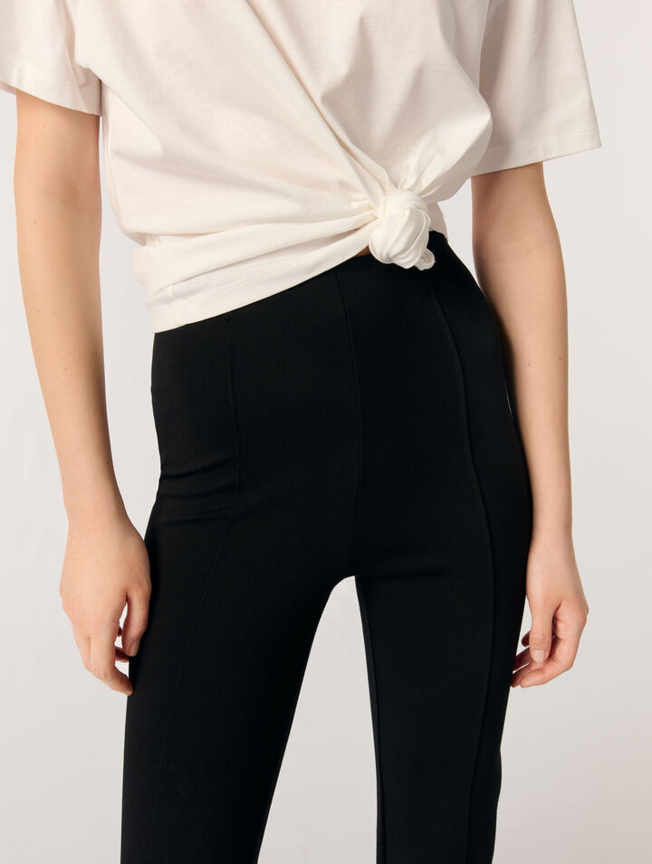 Pantaloni con spacco