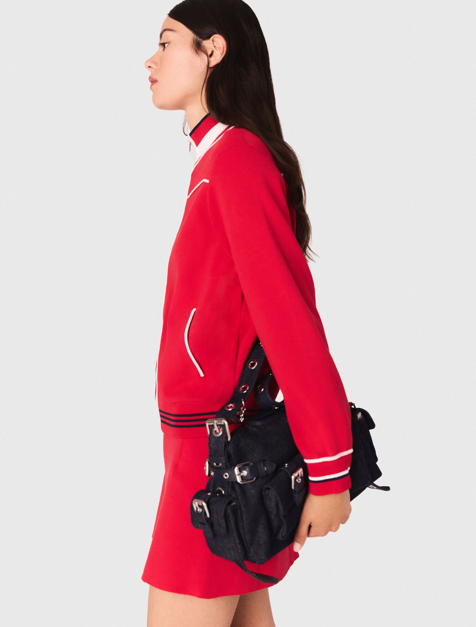 Cardigan con zip e vita elastica