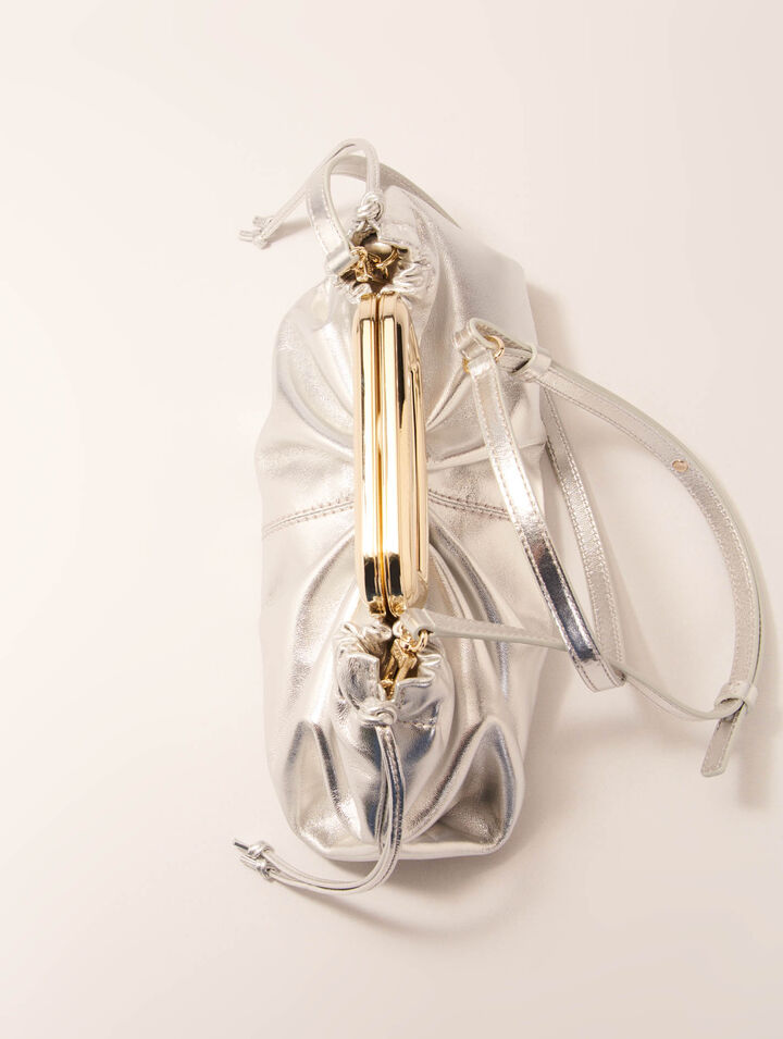 Clutch pelle metal manico metallo