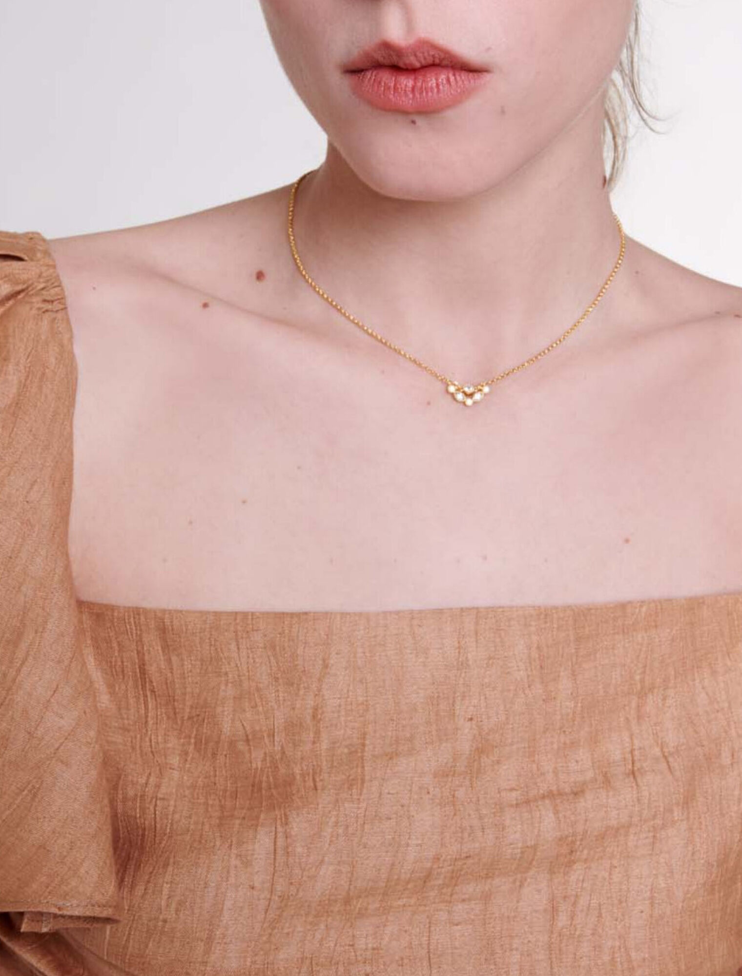 Top in lino con volant