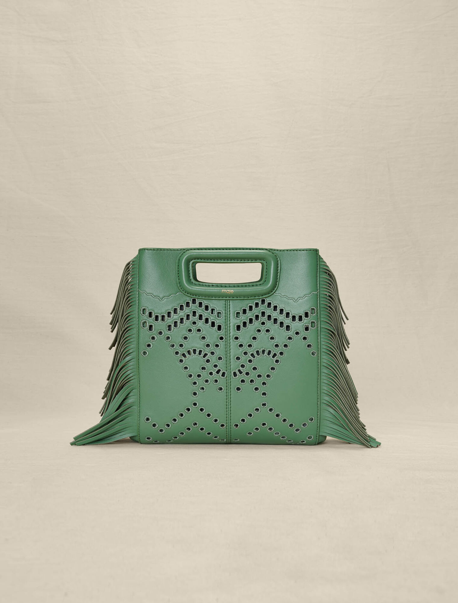Borsa M con frange in pelle traforata