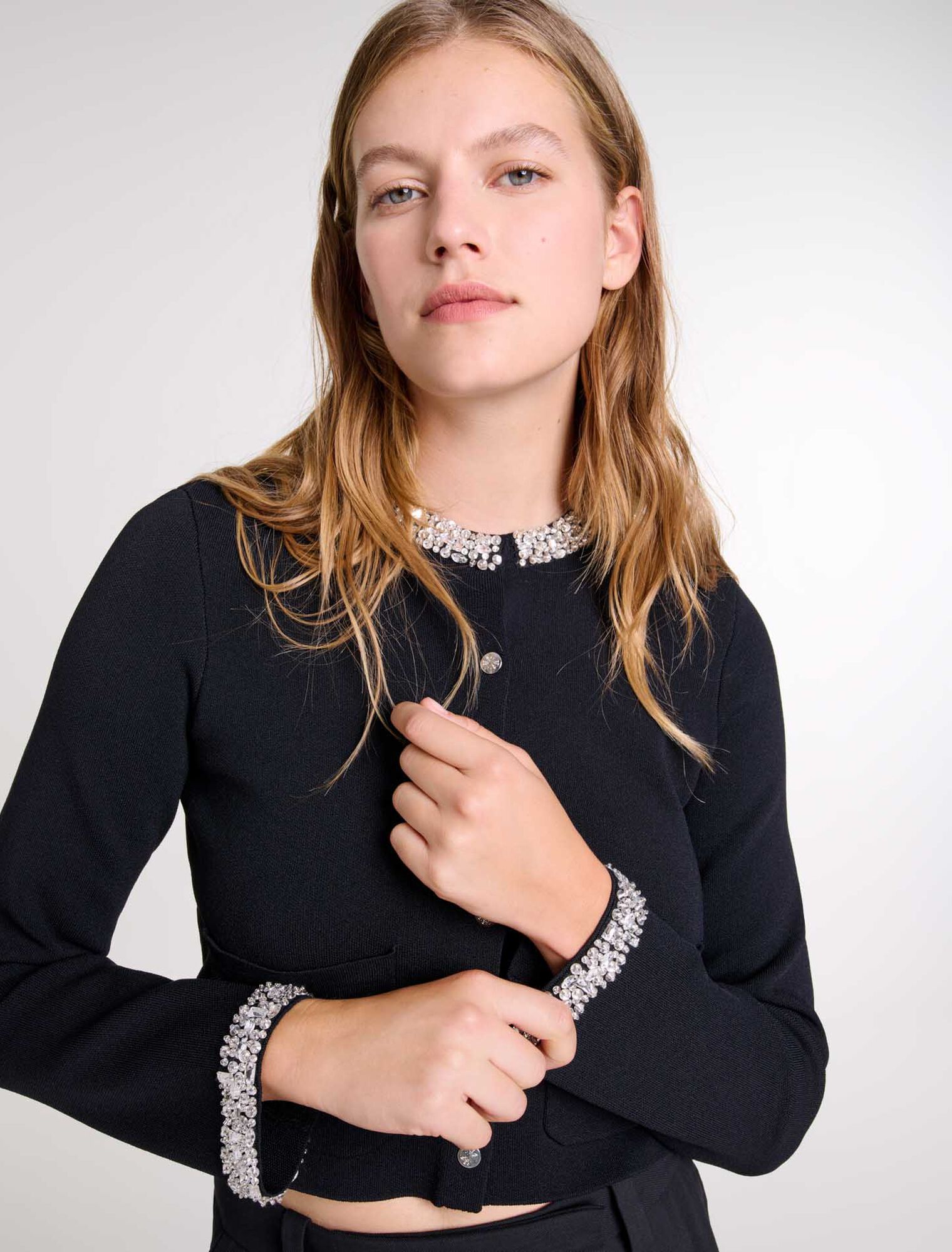 Cardigan con bordi glitterati