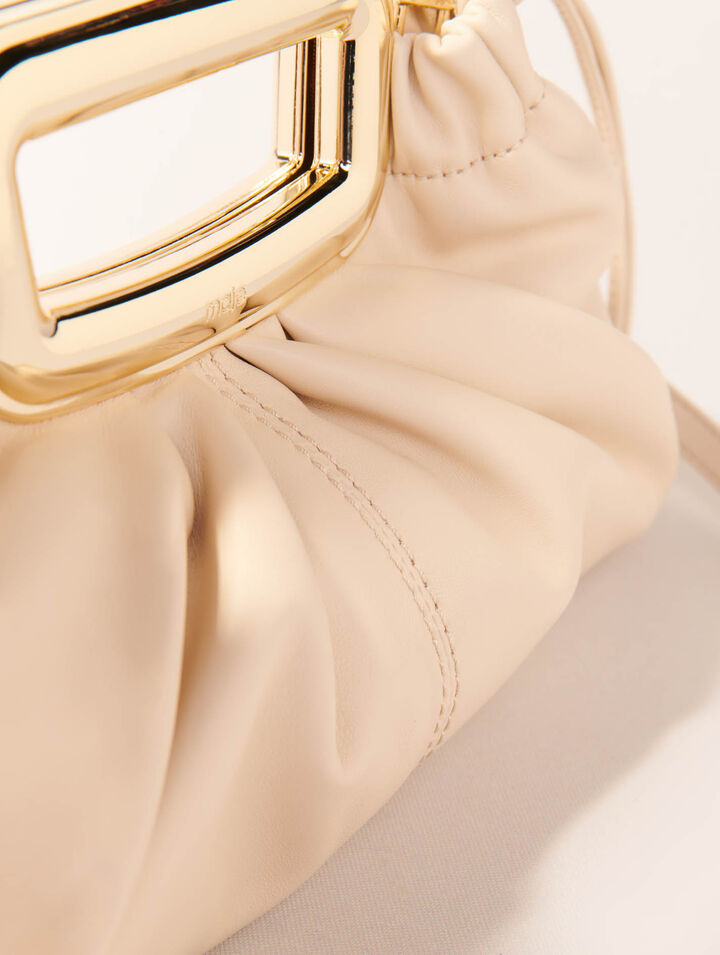 Clutch in pelle manico in metallo