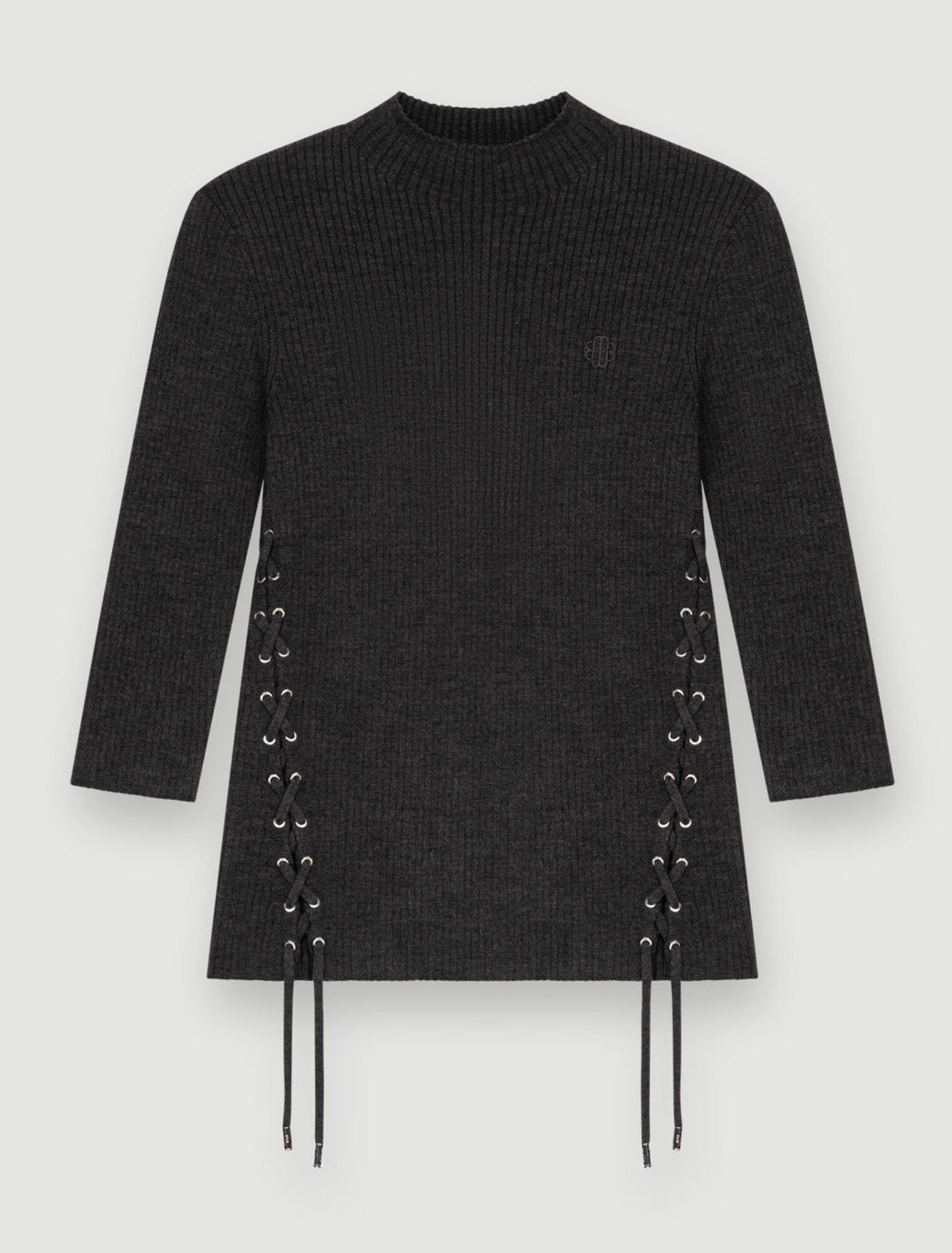 Maglia aderente con occhielli argentati