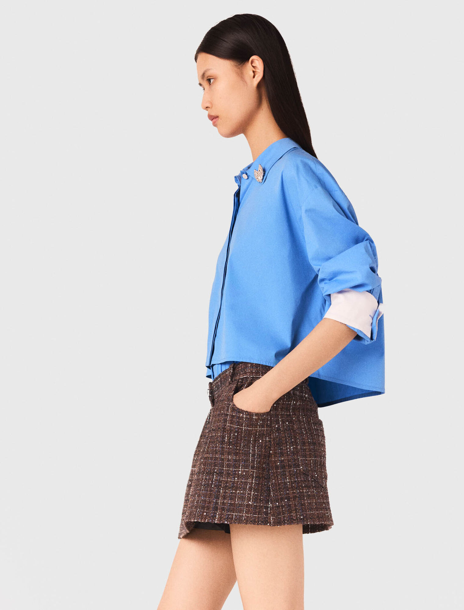 Shorts in tweed con fascia elastica