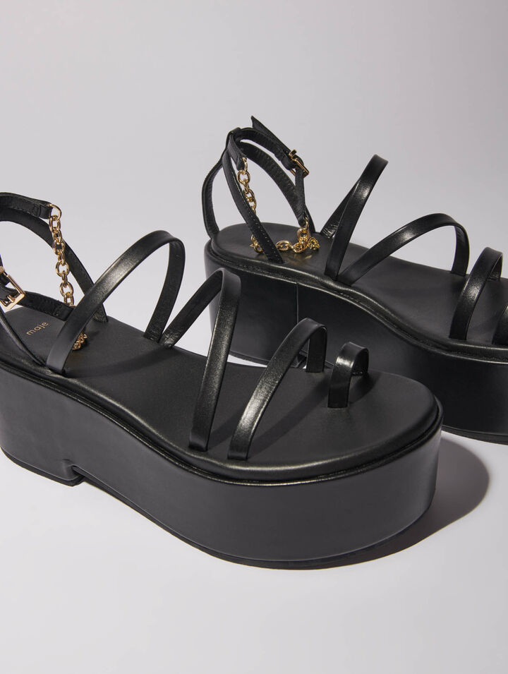 Sandali con zeppa in pelle