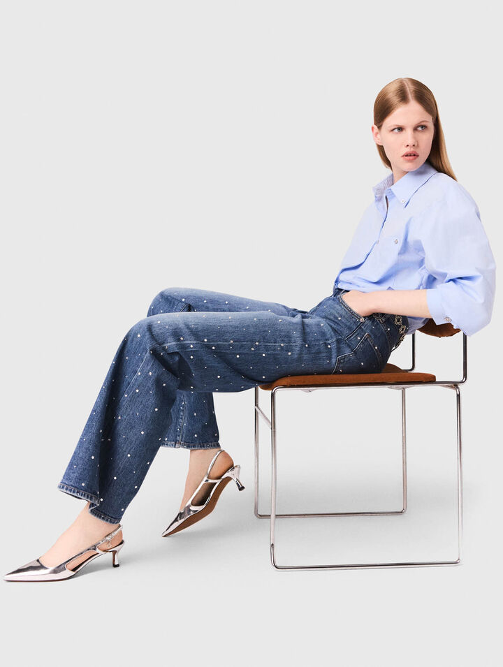 Jeans larghi in denim con borchie