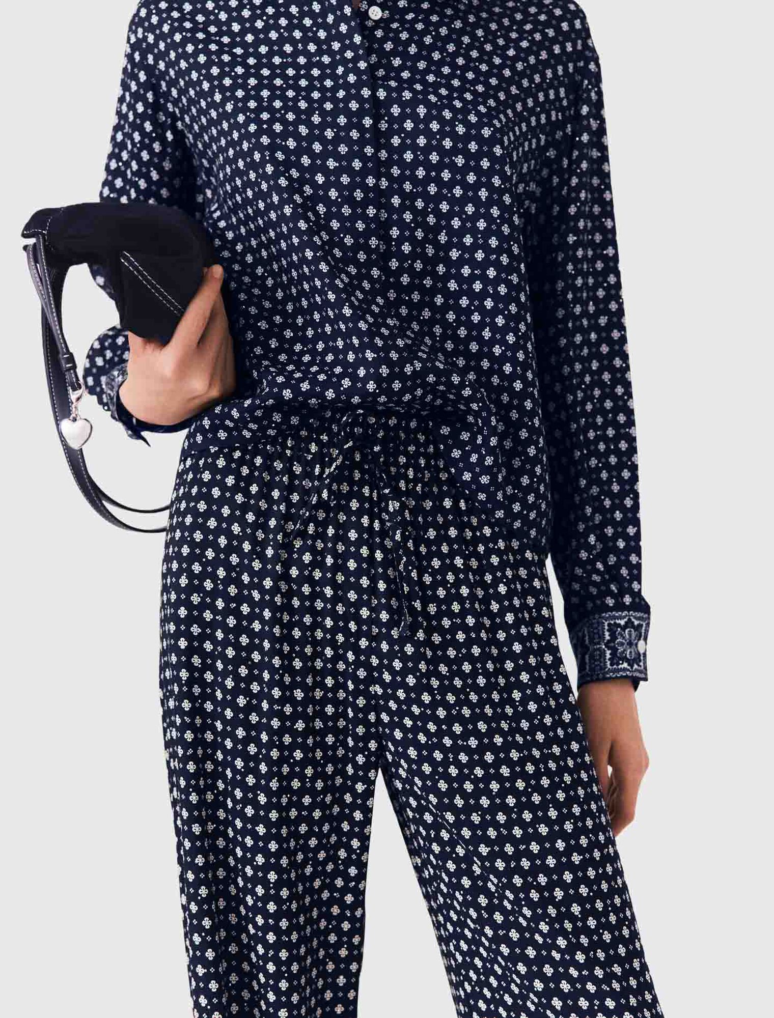Pantaloni stampati con strass