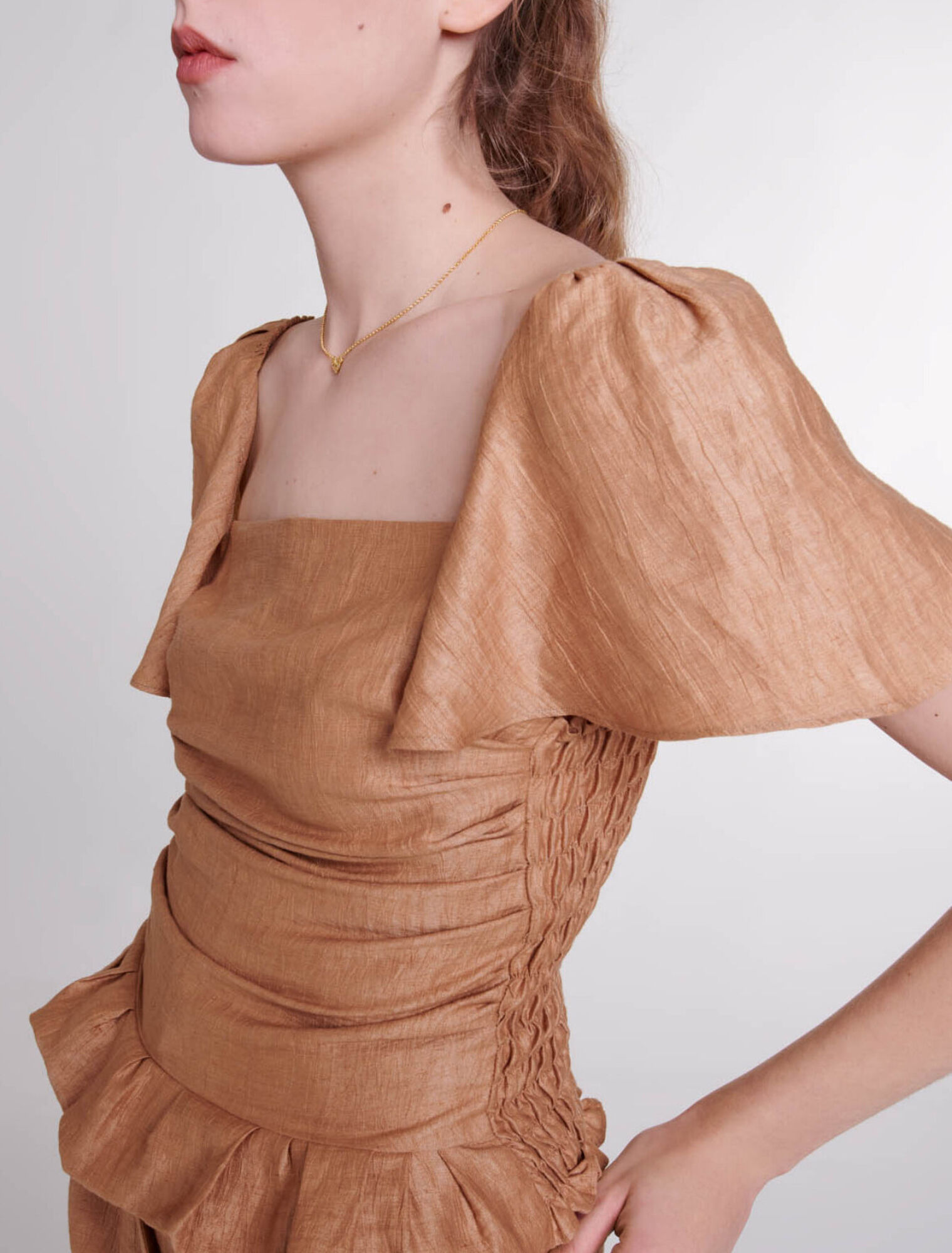 Top in lino con volant