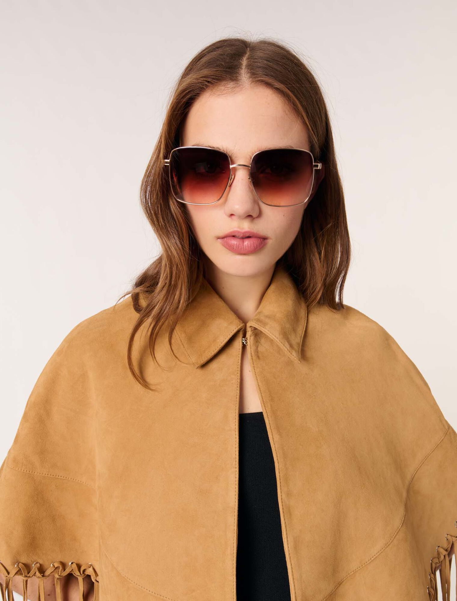 Cappotto corto con frange in nabuk