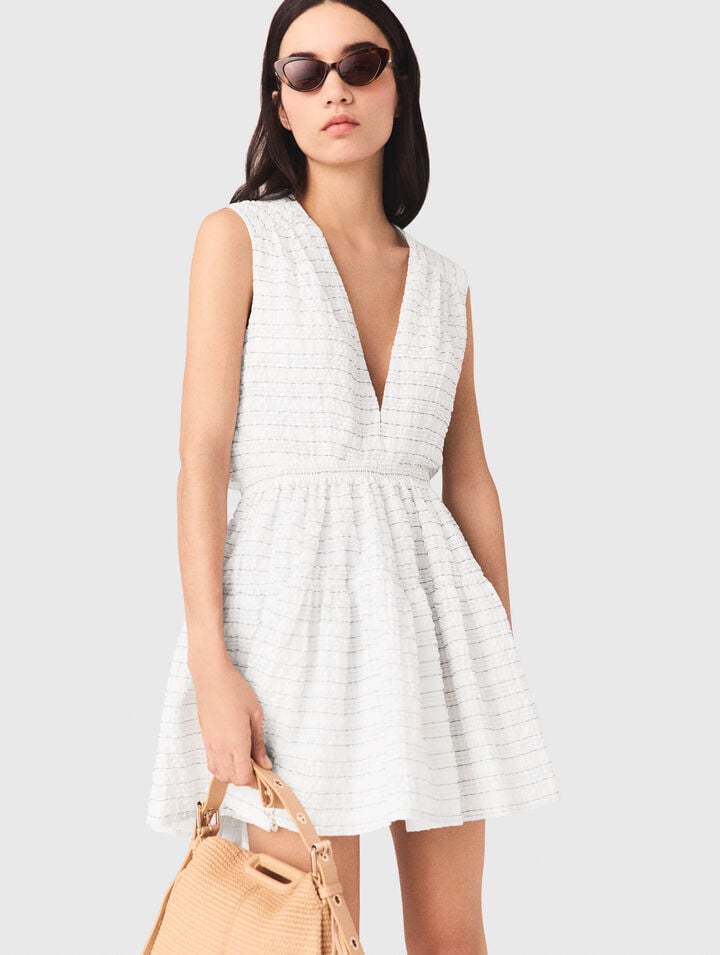 Abito corto svasato schiena aperta