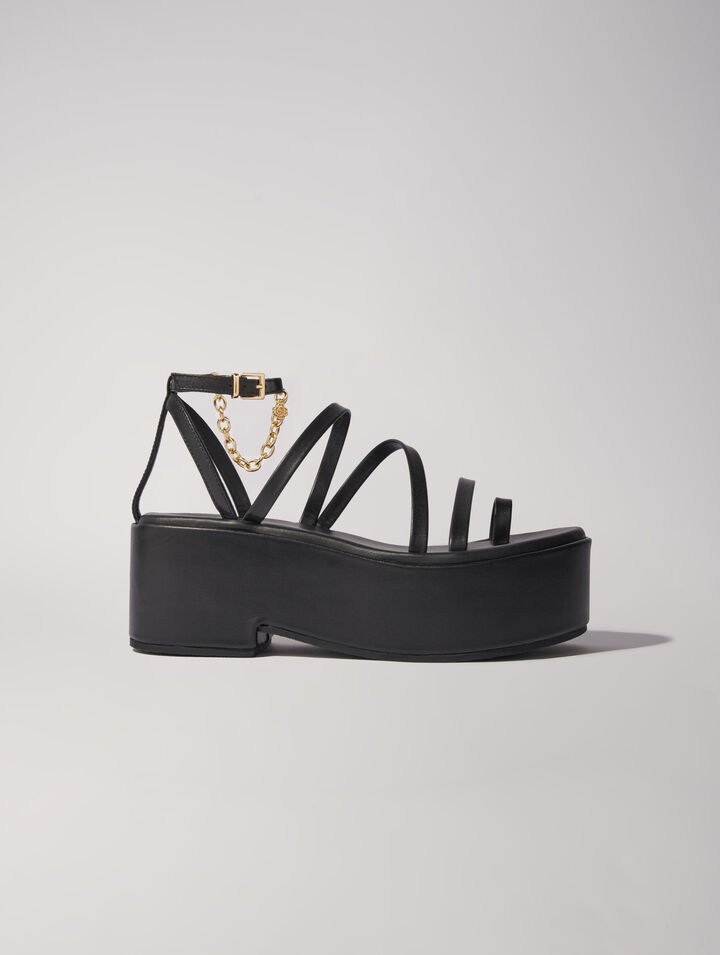 Sandali con zeppa in pelle
