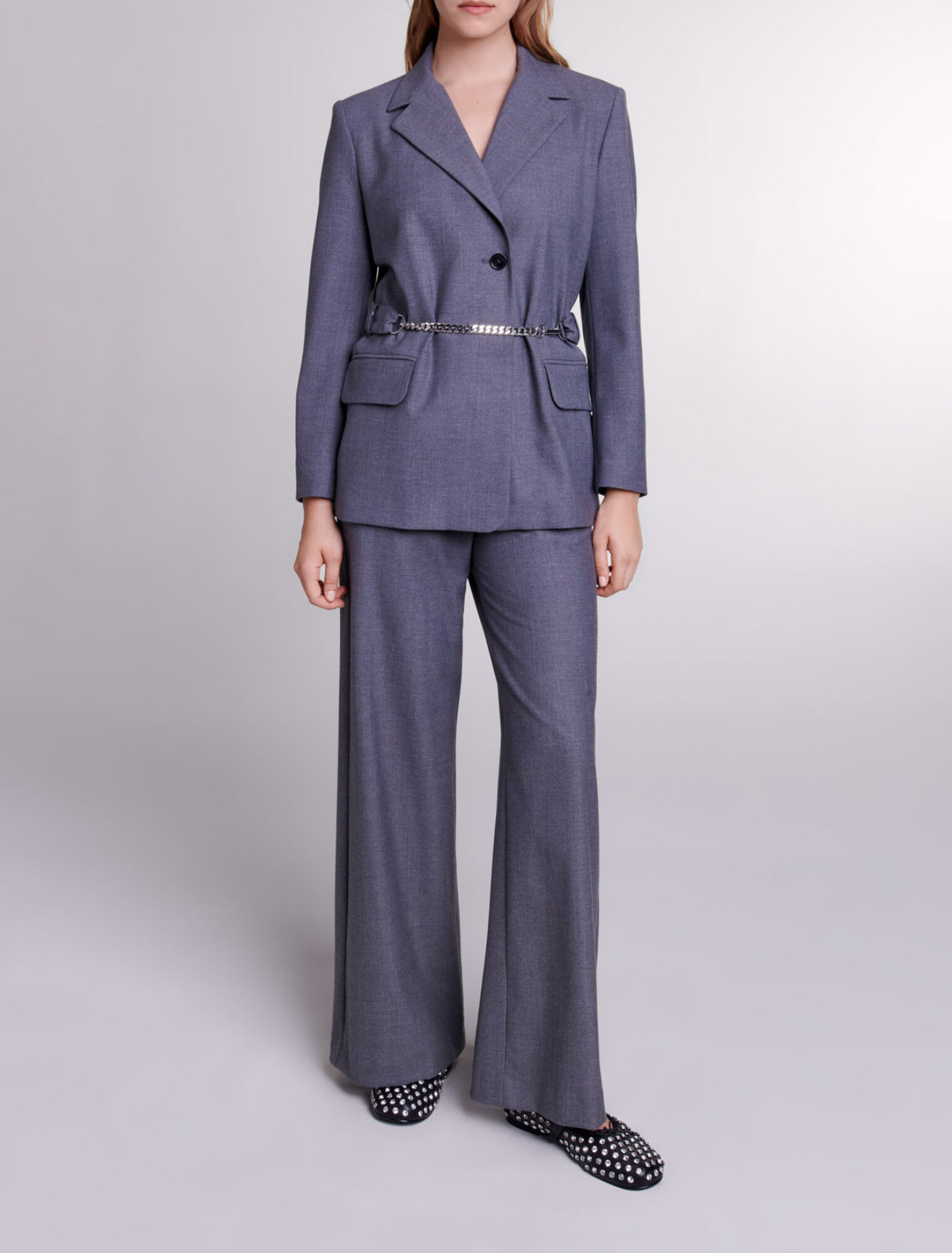 Giacca tailleur con catena in vita