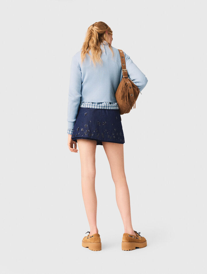 Pullover con gioielli sul retro