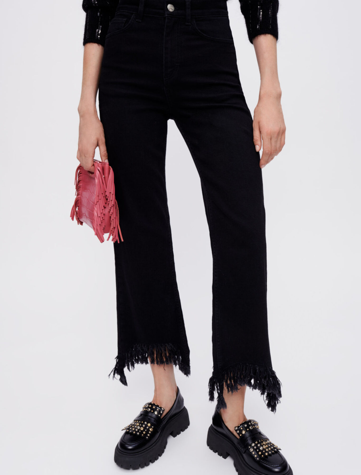 Jeans a vita alta con fondo strappato