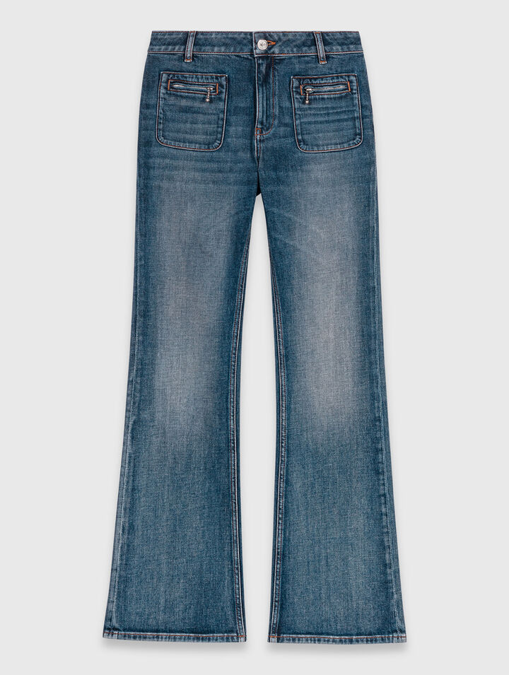 Jeans bootcut con tasche con zip