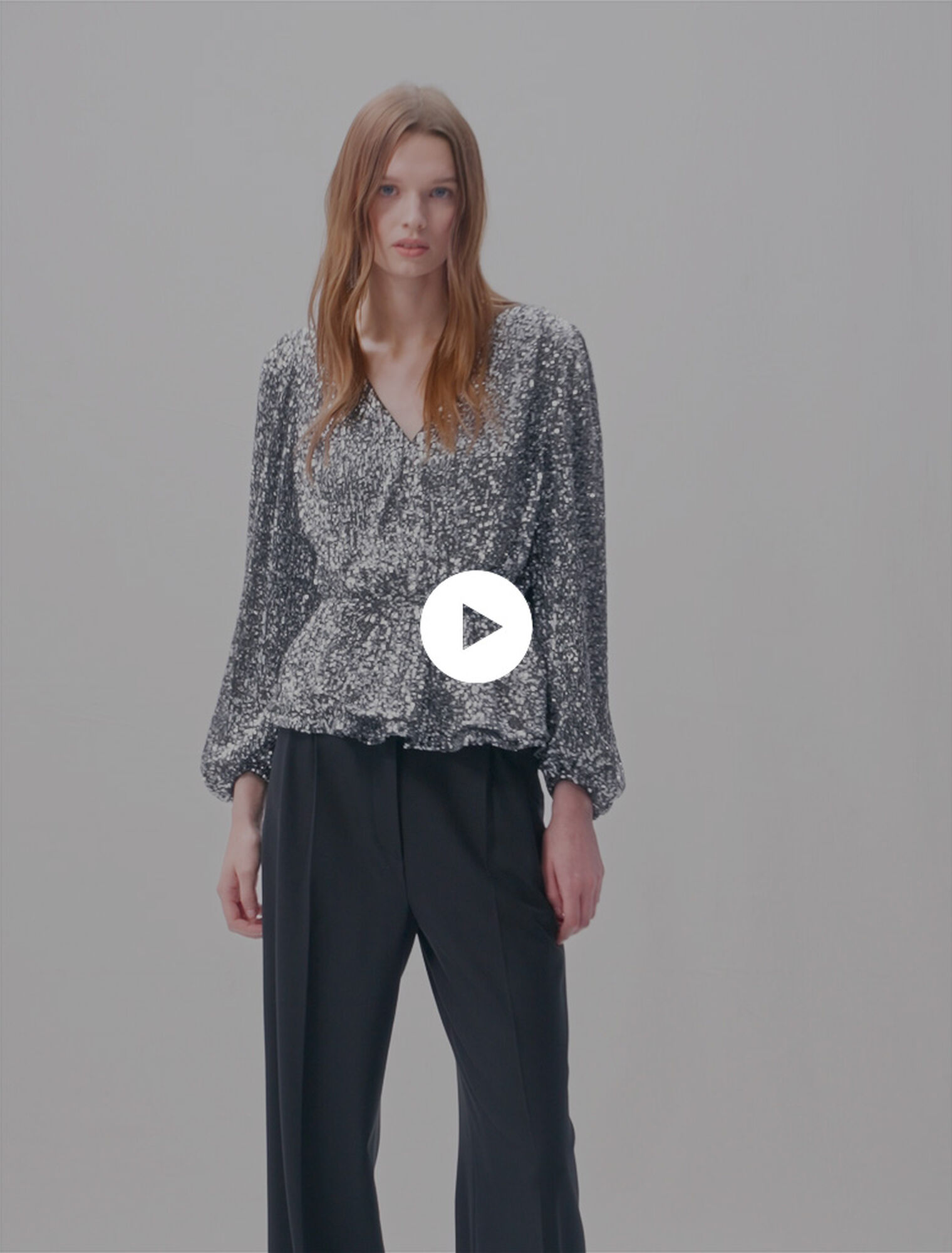 Top a punto smock con lustrini