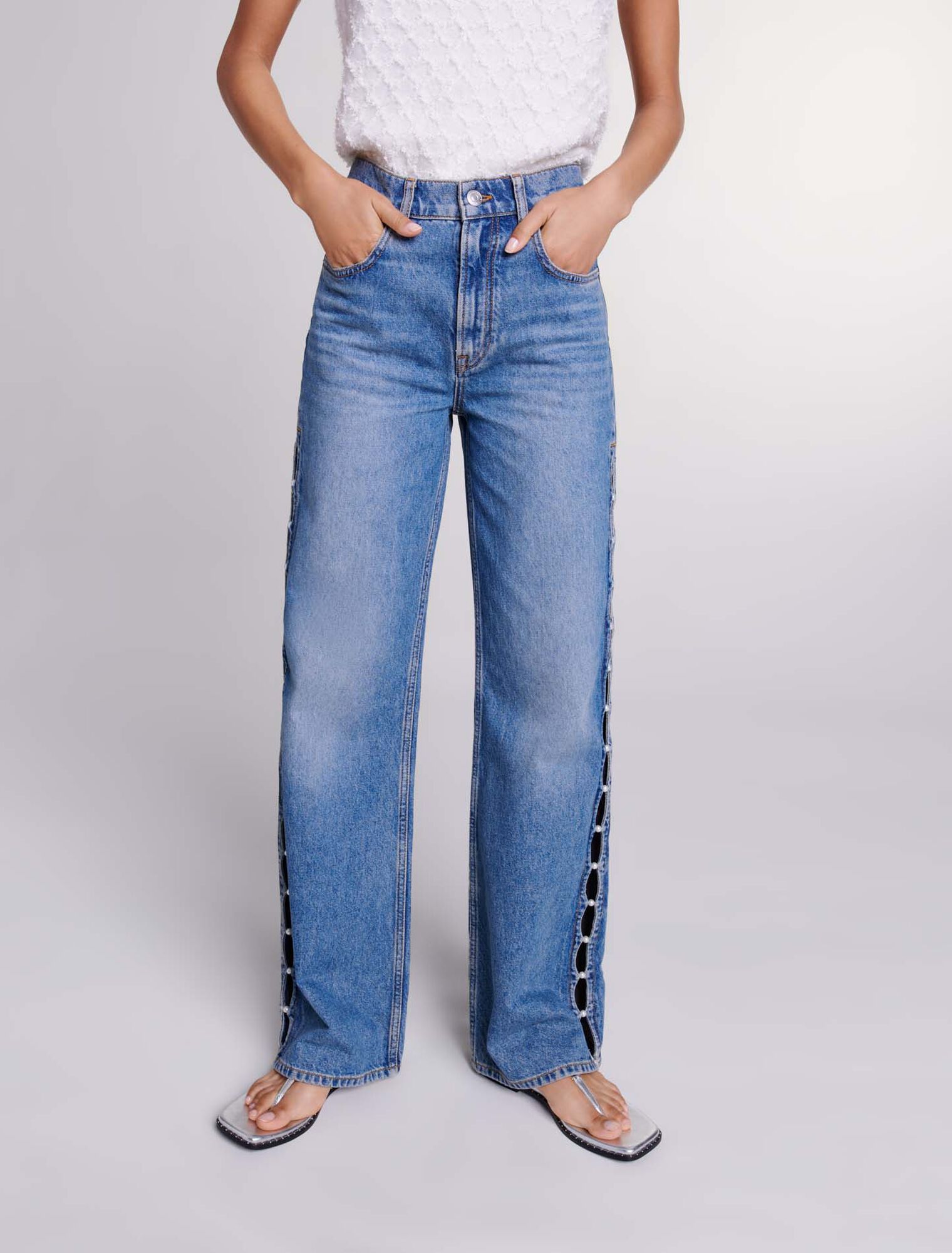 Jeans dritti traforati con perline