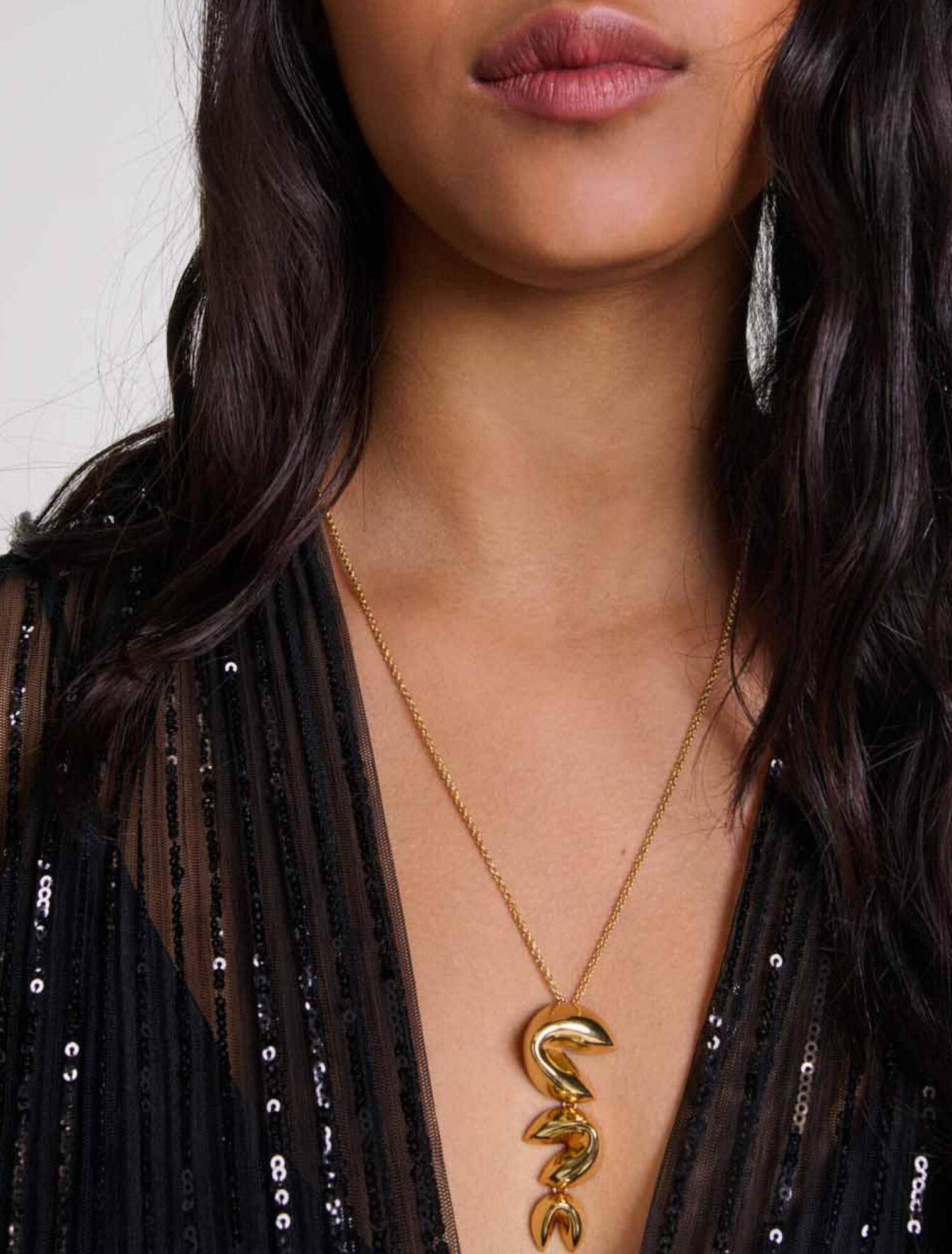 Abito lungo con lustrini