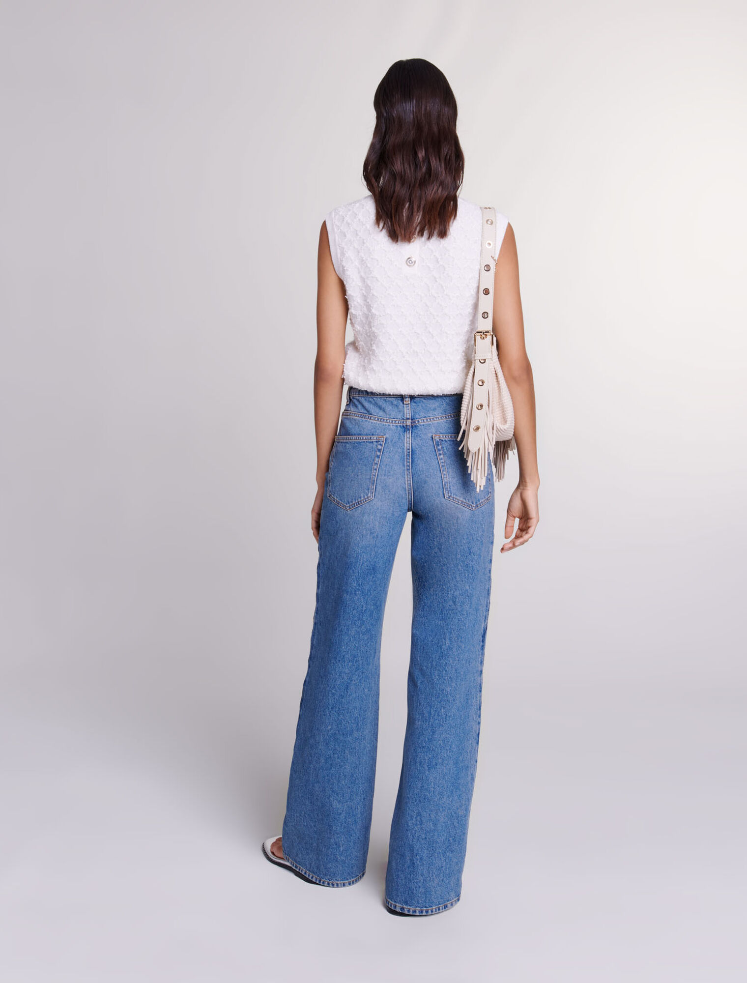 Jeans dritti traforati con perline