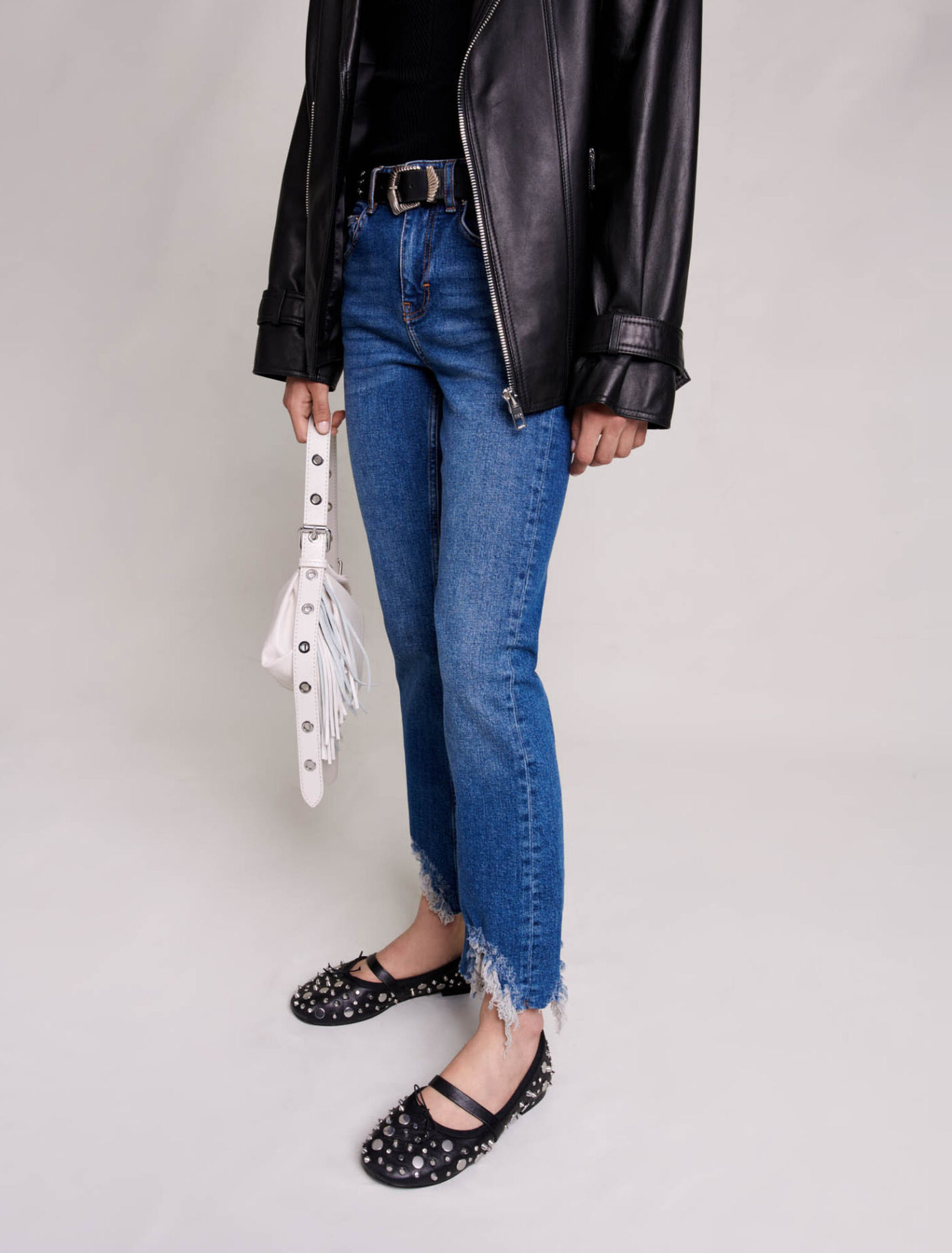 Jeans skinny strappati