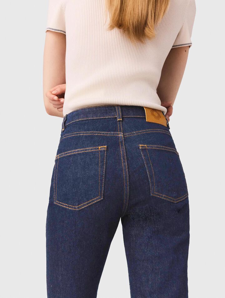 Jeans in denim con tasche