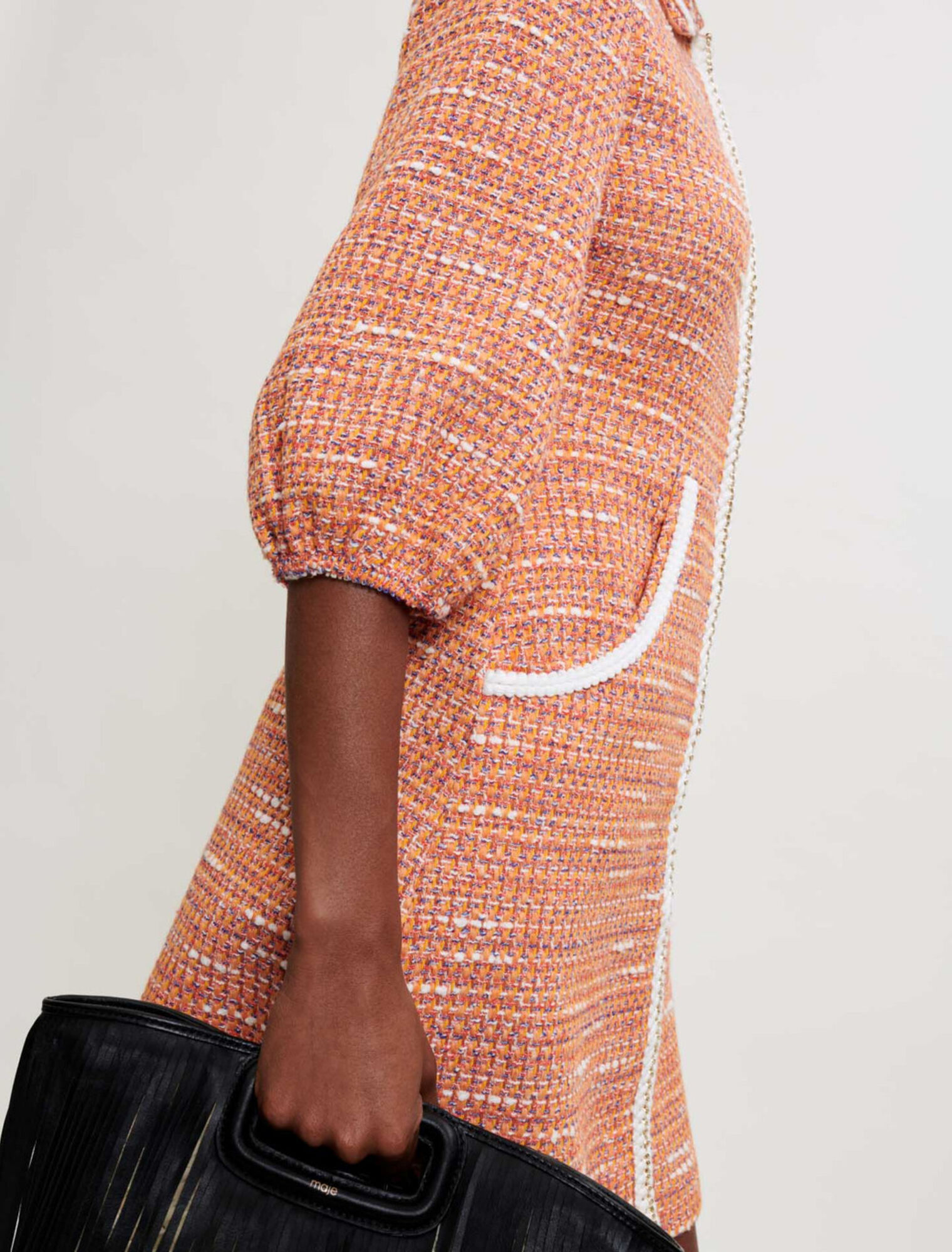 Abito in tweed con trecce