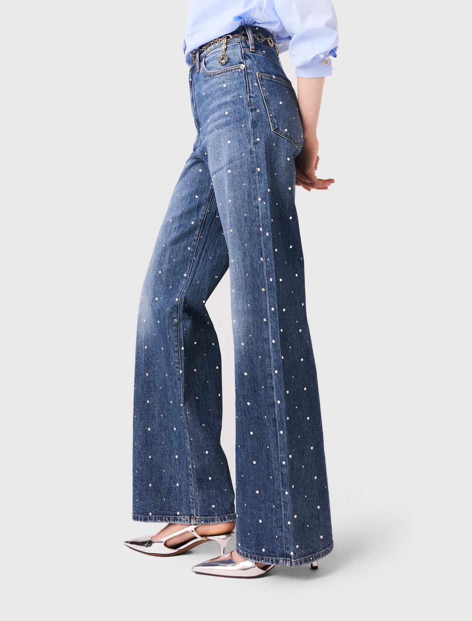 Jeans larghi in denim con borchie