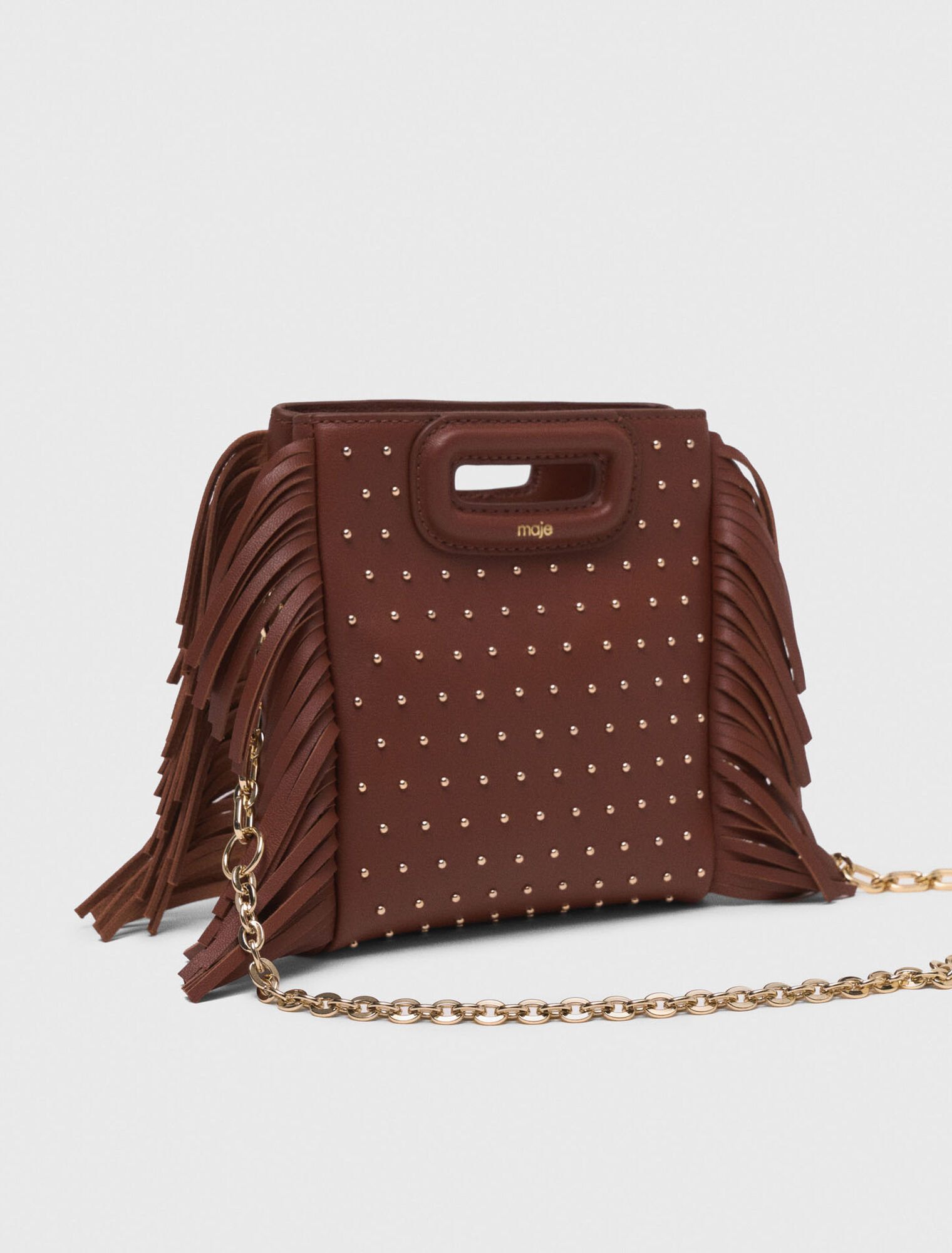 Borsa M mini in pelle e borchie