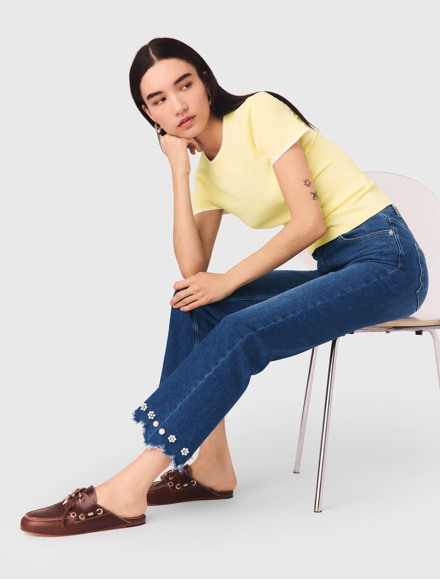 Jeans bootcut con perle