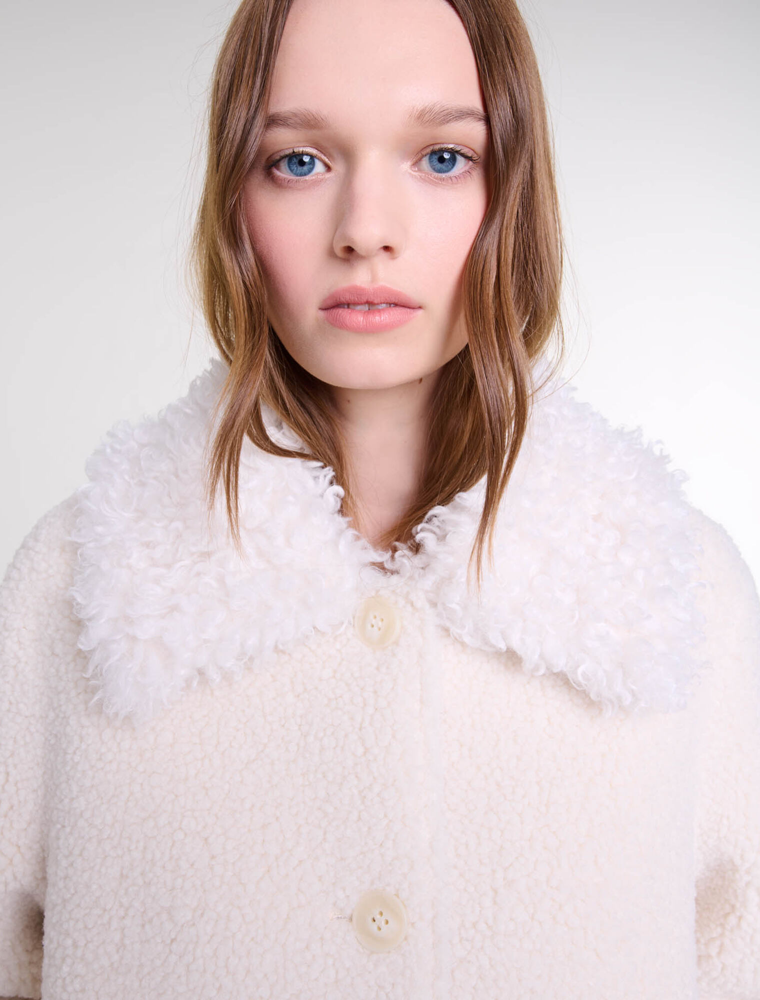 Cappotto corto in ecopelliccia