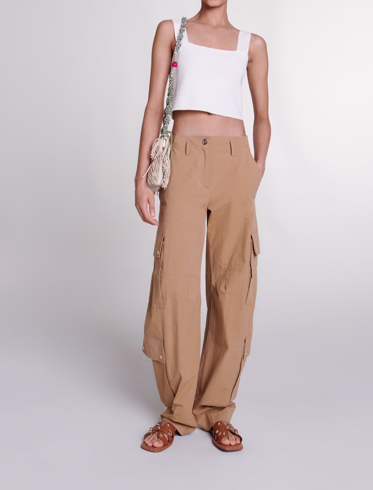 Mules in pelle borchiate