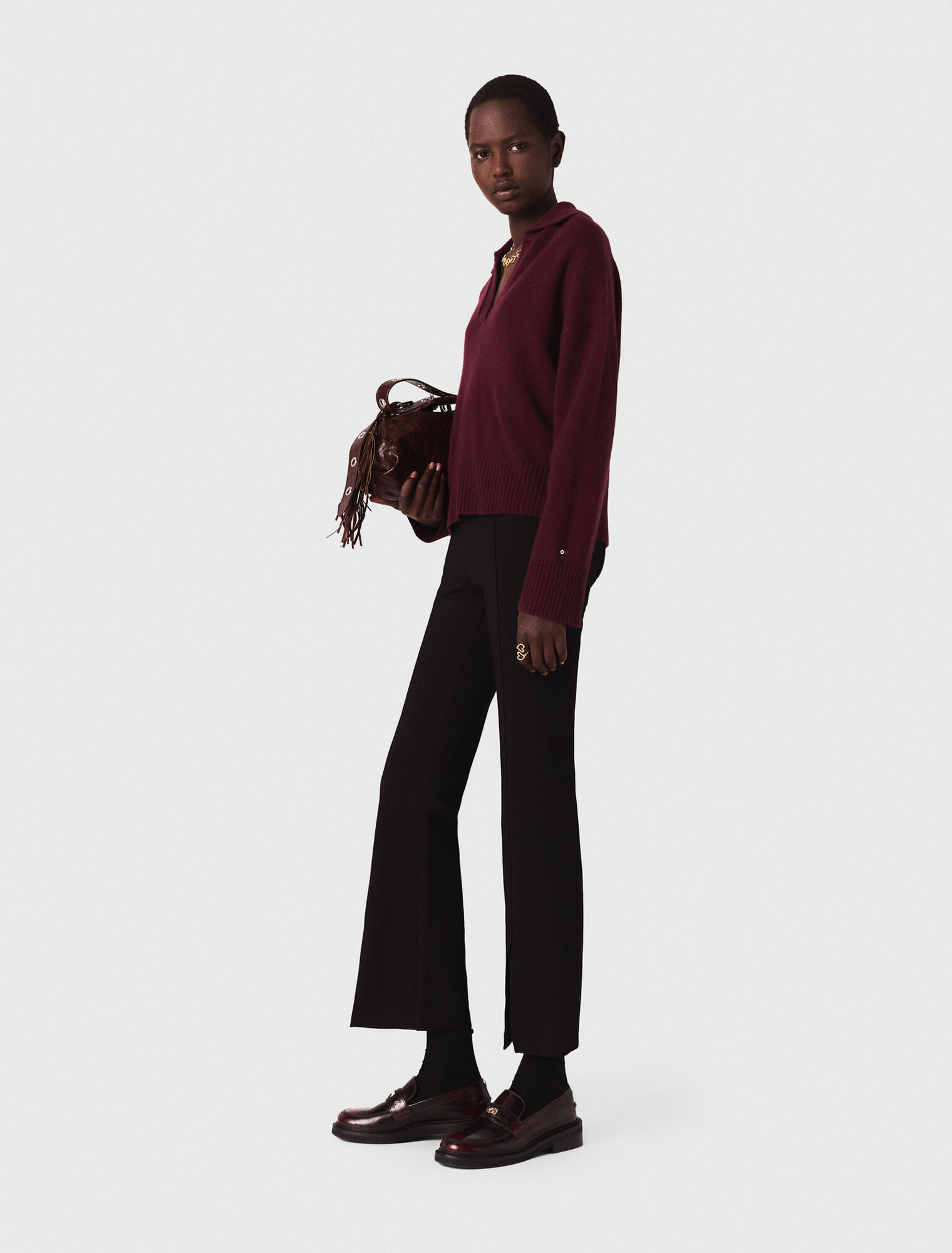 Pantaloni con spacco
