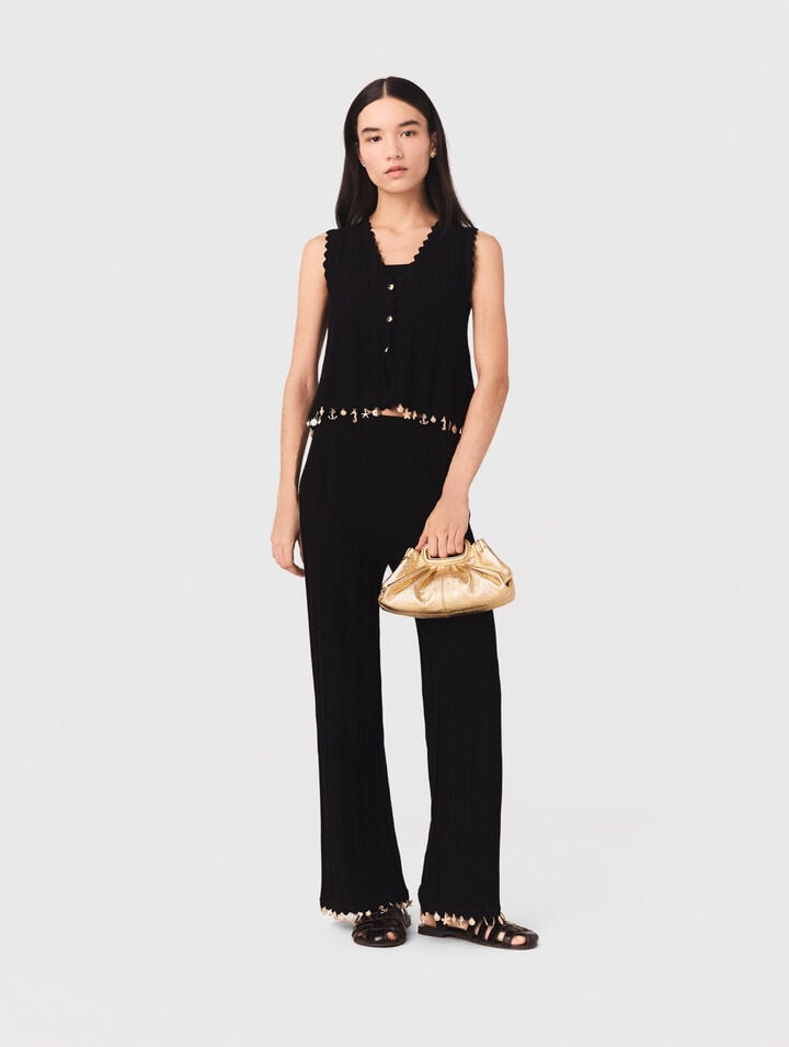 Gilet in maglia con bijoux dorati