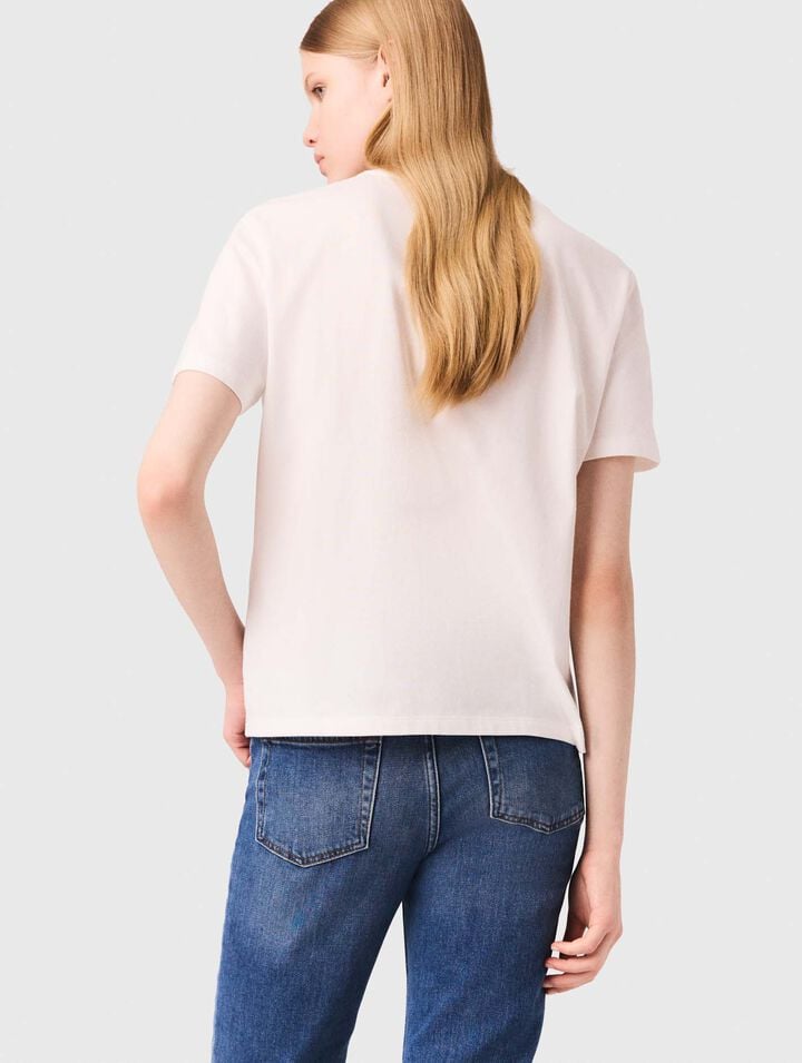 T-shirt con tasca ricamata